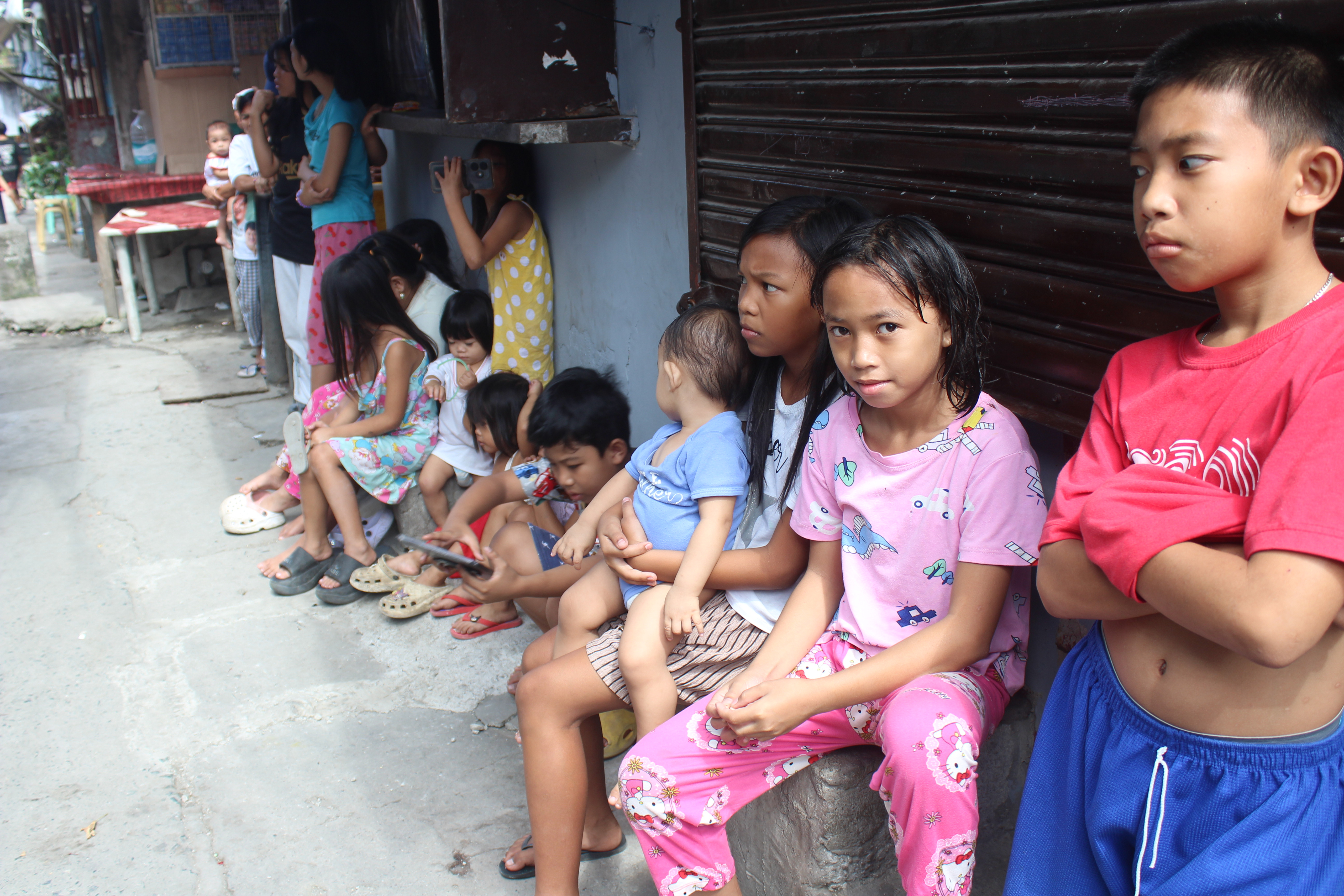 Community members gathered in a neighborhood