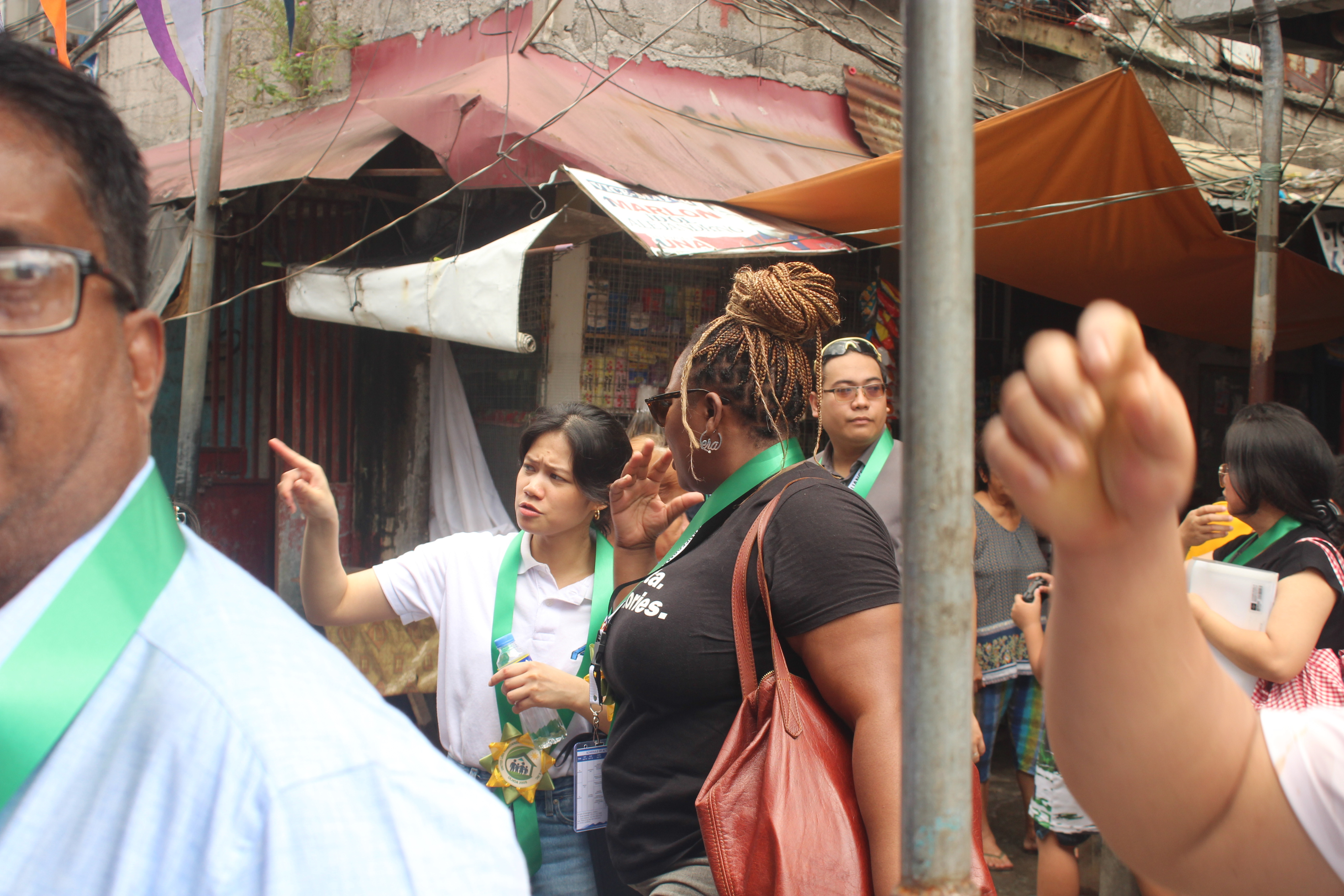 Community organizers speaking with residents